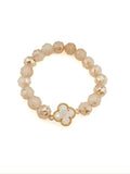 Amara Clover Bracelet with neutral faceted beads and gold-tone clover charm from Ardor Boutique