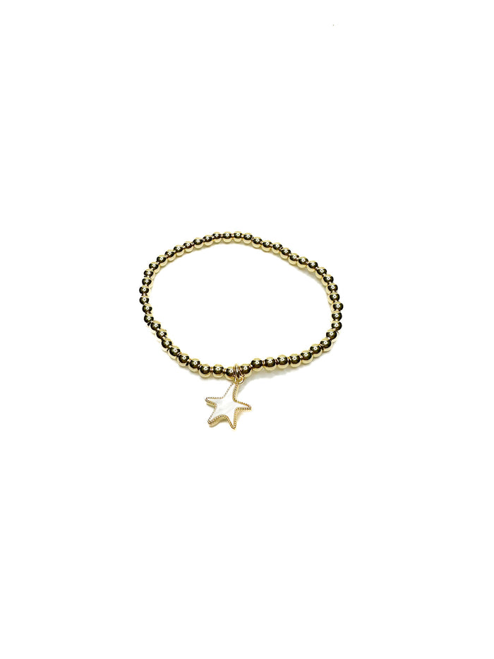 Gold bracelet with a star-shaped charm on a white background