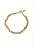 Gold chain bracelet on a white background