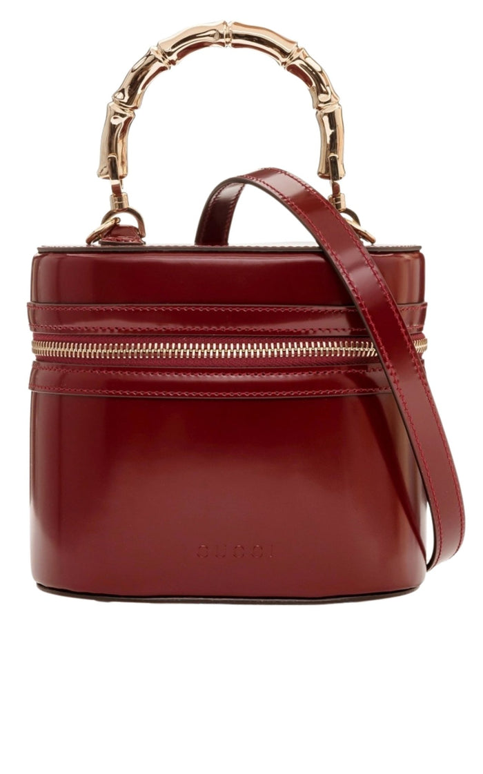 Gucci burgundy glossy leather bucket bag with bamboo-inspired top handle