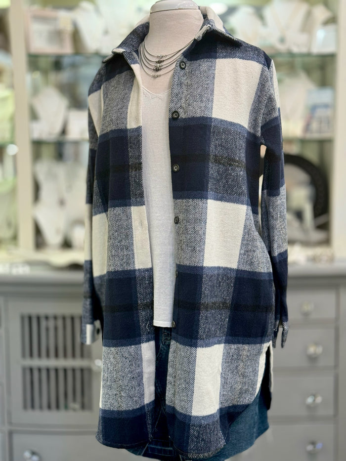 Women’s navy plaid button-down shacket with relaxed fit and pockets.
