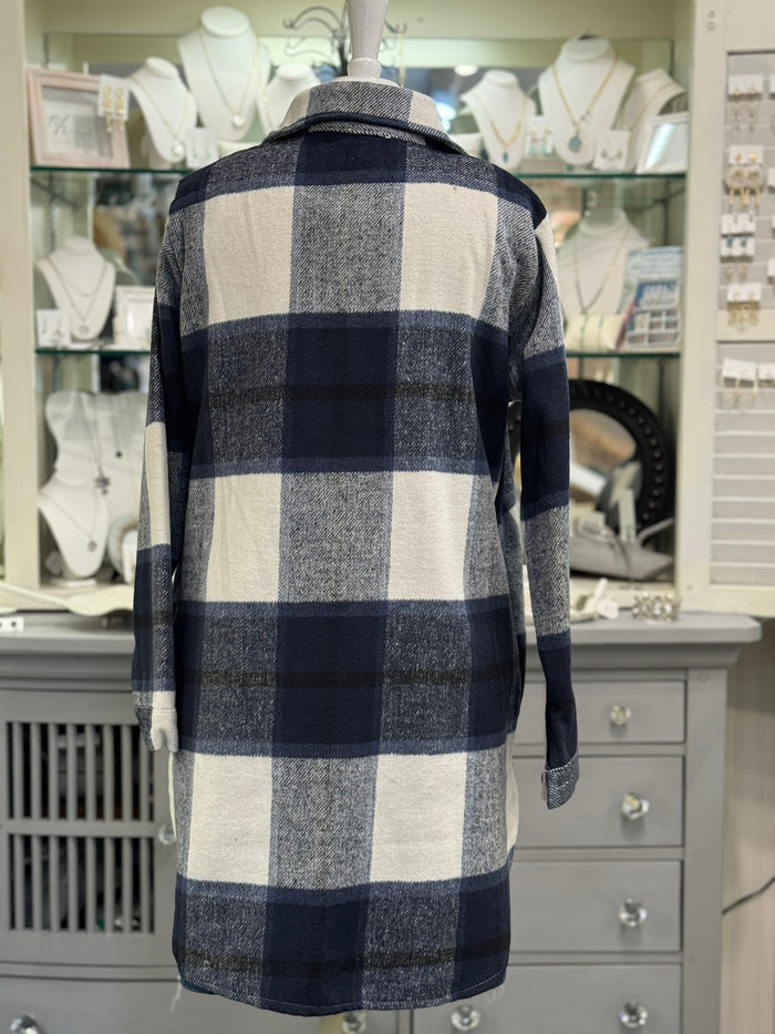 Back of women’s navy check plaid button-down shacket, lightweight layering jacket.