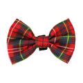 The Sassy Woof Cat Bowtie - Deck the Paws features a red plaid tartan pattern with green, yellow, blue, and white lines—perfect for a holiday cat outfit—shown on a white background.