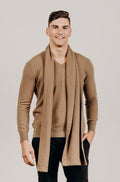 Man wearing a light brown Classic Cervelt Scarf - Kapeka NZ, Made from New Zealand Red Deer Fibre. Very Soft and rare Fibre. Only made in New Zealand