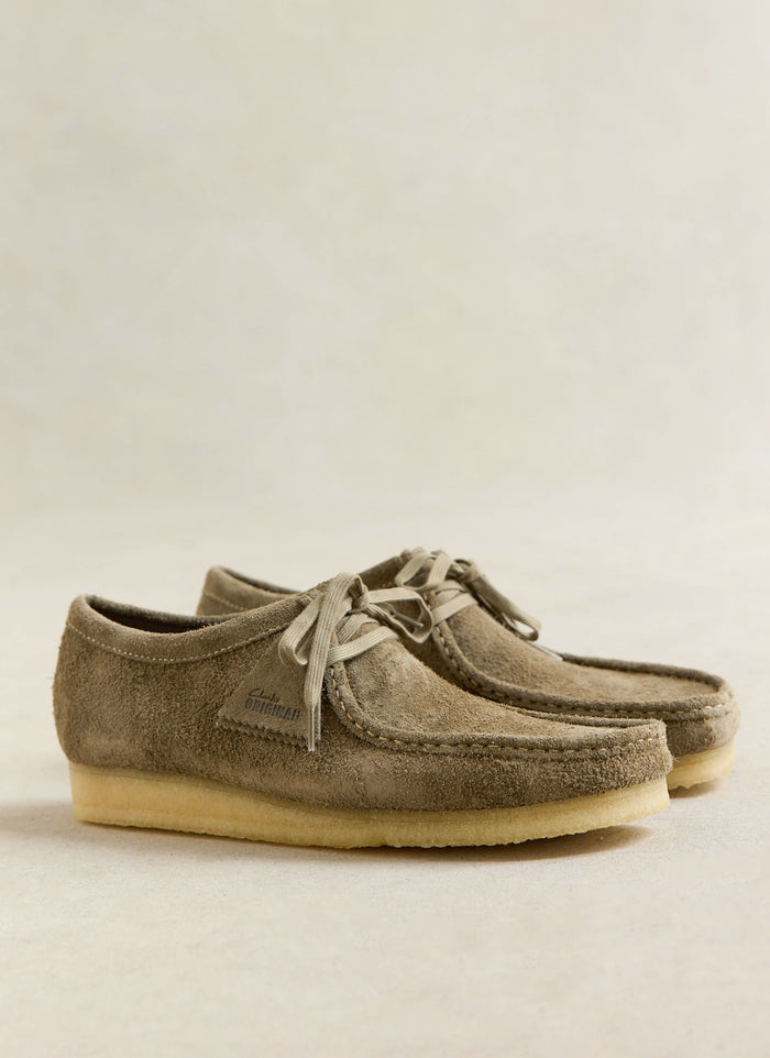 Smoke grey suede Clarks Originals Wallabee shoes featuring crepe soles and moccasin stitching from Percival.