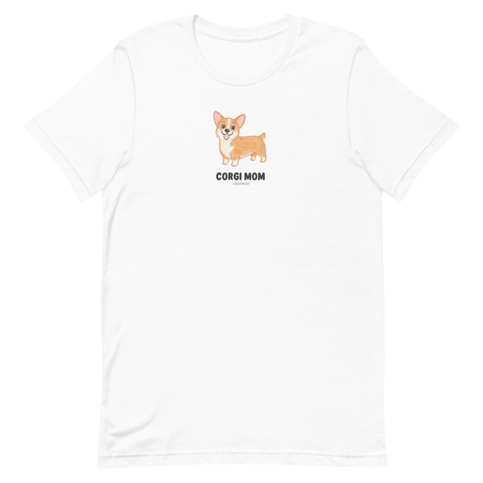 The Sassy Woof Corgi Mom Tee features a cute brown corgi illustration above bold “CORGI MOM” text, making it the perfect t-shirt for proud pet lovers.