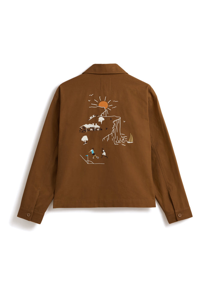 Back of the brown Percival x Brighton & Hove Albion F.C. Canvas Workshirt featuring the coastal scene back embroidery.