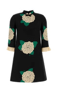 Valentino Crepe Couture floral minidress with high neckline, bow detail, three-quarter sleeves, and ruffled cuffs, front view