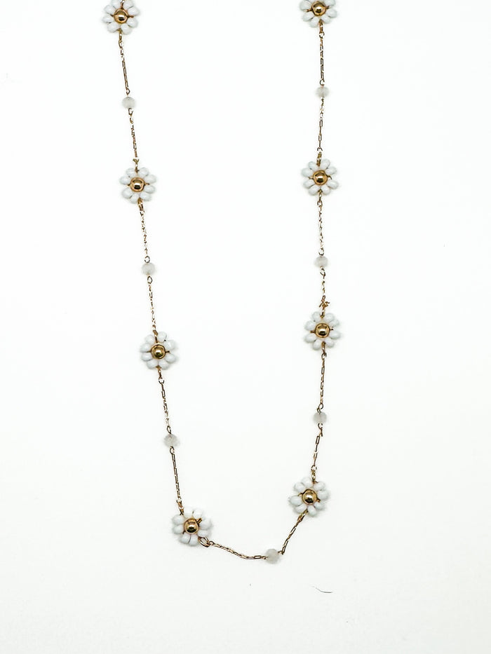 Necklace with floral designs on a white background