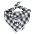 The Sassy Woof Dog Bandana - My Mom is my BFF features black and white checks, a heart, and playful text. It ties at the top, sports a Sassy Woof tag, and pairs perfectly with matching adjustable harnesses for a coordinated look.