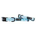 Two Sassy Woof Dog Collar - Blueberry Milk in blue and white pattern with black buckles are shown on a white background.