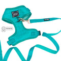 The Sassy Woof Dog Two Piece Bundle - Napa features a turquoise adjustable harness and leash, offering comfort and style for your pup.