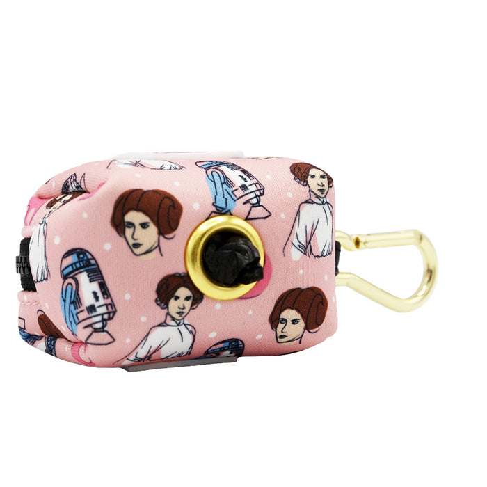 The Sassy Woof Dog Waste Bag Holder - STAR WARS™ Princess Leia is a pink holder with cartoon Leia and R2-D2, a gold clasp, and a convenient dispensing hole.