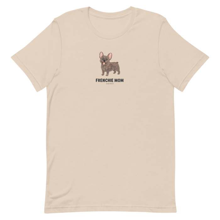 The Sassy Woof Frenchie Mom Tee is a beige t-shirt with a small brown French Bulldog illustration and "FRENCHIE MOM" text on the front—perfect for any breed t-shirt collection.