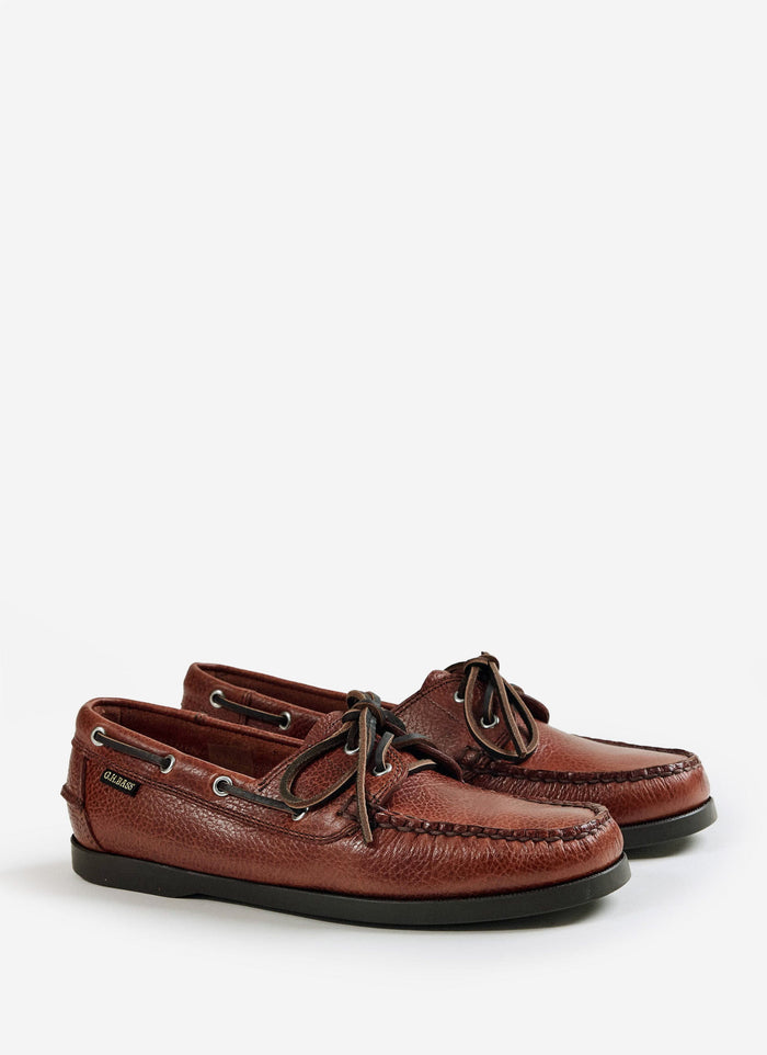 A studio shot of the G.H. Bass Jetty II Boater 2 Eye in textured tan leather from Percival, showing the hand-sewn details.