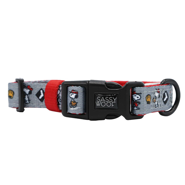 The Sassy Woof Harness Three Piece Bundle - MLB™ x Peanuts™ Chicago White Sox™ features a gray and red adjustable dog collar with Snoopy and Woodstock prints, a black Sassy Woof buckle, metal D-ring—ideal to pair with your puppy's harness set.