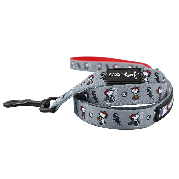 The Sassy Woof Harness Three Piece Bundle - MLB™ x Peanuts™ Chicago White Sox™ features Snoopy in a baseball uniform with team logos, perfect for your pup’s growth and matching leash and harness needs.