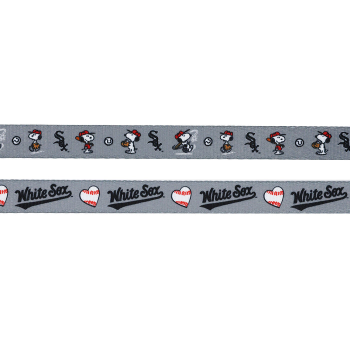 The Sassy Woof Harness Three Piece Bundle - MLB™ x Peanuts™ Chicago White Sox™ features gray ribbon with Snoopy in a baseball uniform, the team logo, baseballs, and sporty graphics—perfect for fans and their pups.