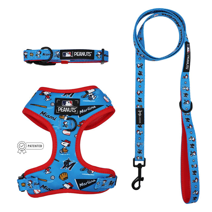 Show your team spirit with the Sassy Woof Harness Three Piece Bundle - MLB™ x Peanuts™ Miami Marlins™ featuring Snoopy, bats, and baseballs. This adjustable set includes a harness, collar, and leash—perfect for fans and growing pups!.