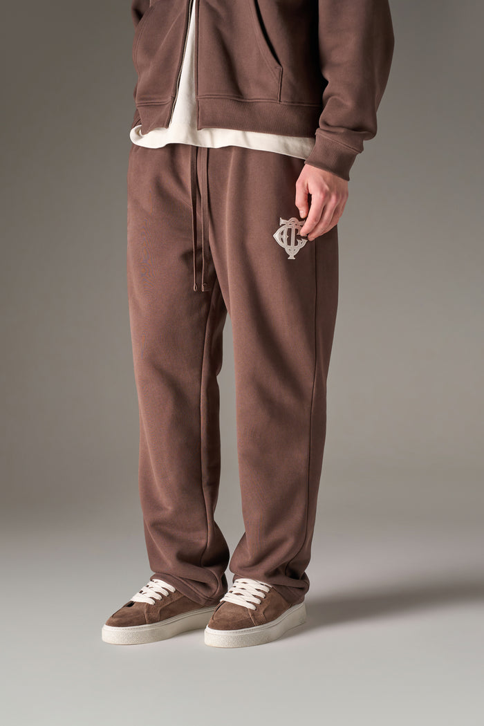 HEAVYWEIGHT MONOGRAM APPLIQUE EMBLEM JOGGERS - BROWN