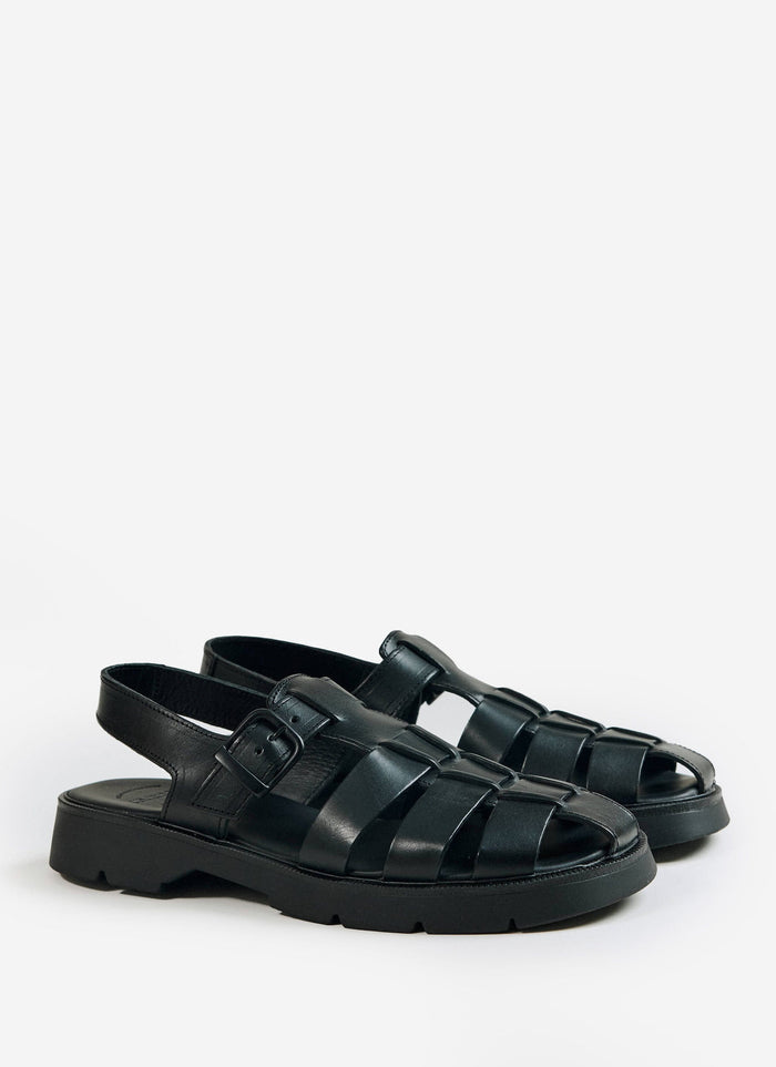 A pair of black Kleman Babord VGT fisherman sandals with a rugged lug sole and buckle strap, from Percival.