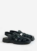 A pair of black Kleman Babord VGT fisherman sandals with a rugged lug sole and buckle strap, from Percival.