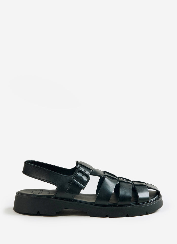 A side profile of the Kleman Babord VGT fisherman sandal in black leather with a rugged lug sole from Percival.