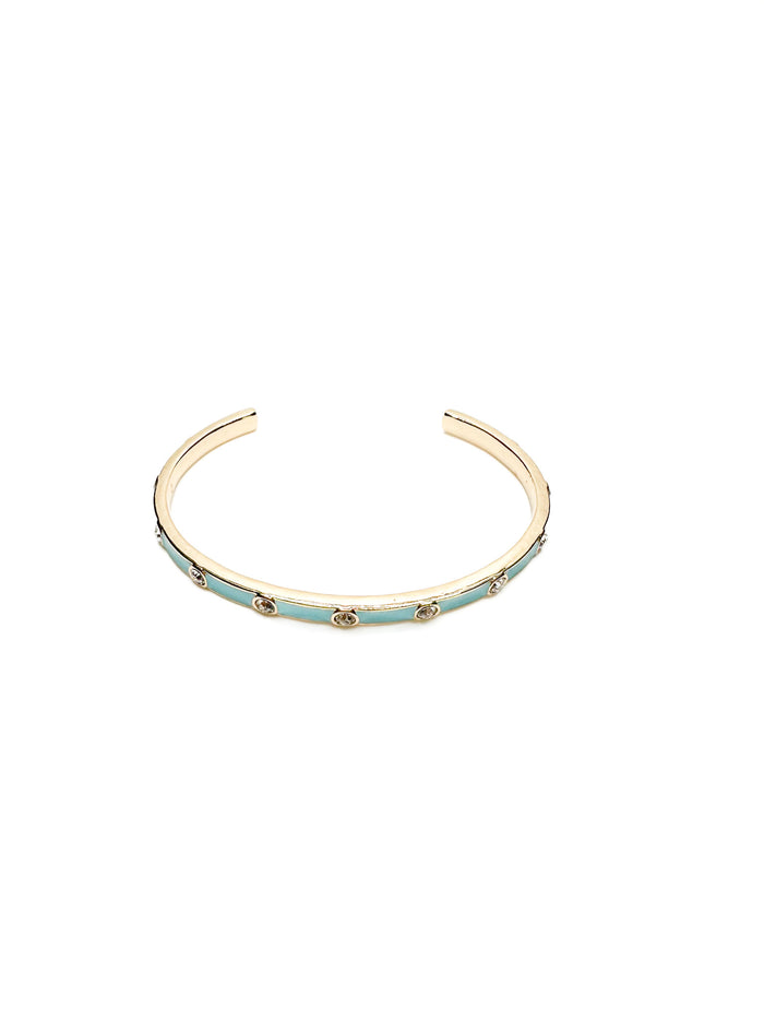 Gold open cuff bracelet with turquoise enamel and clear crystal accents, shown on white background.