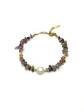 Close-up of the Mira Tourmaline & Freshwater Pearl Bracelet with multicolor tourmaline chips and a single round freshwater pearl on a gold-tone chain at Ardor Boutique.