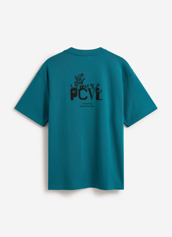 Back of the Percival Aura Boxy Printed T Shirt in blue, featuring a large black PCVL graphic and slogan.