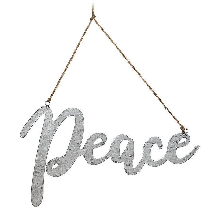 Decorative sign with 'Peace' text hanging on a white background