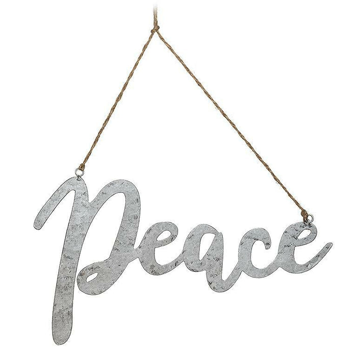 Decorative sign with 'Peace' text hanging on a white background