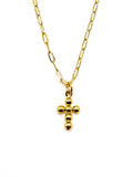 Gold necklace with a small cross pendant on a white background